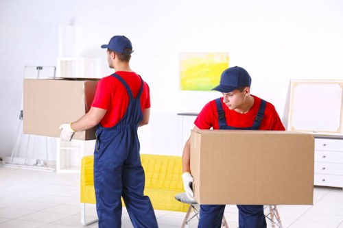 Moving boxes and a relocation team in Kennington