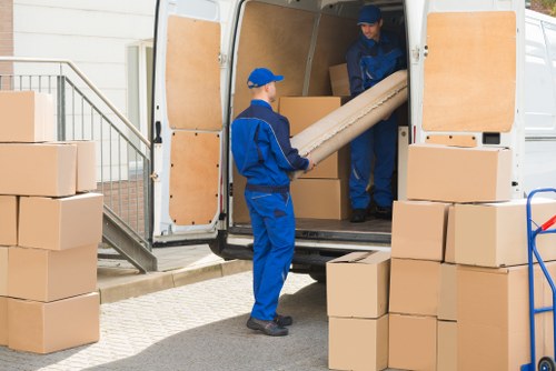 Movers Kennington van with packed recyclable moving boxes