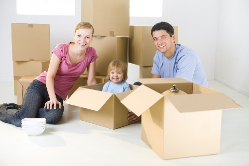 Removal van and moving team preparing a local property move in Kennington