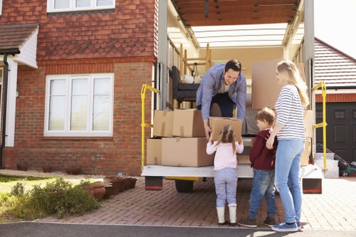 Careful handling of desks and boxes during a student move