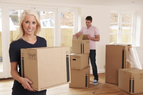 Movers handling a complaint with documentation and notes