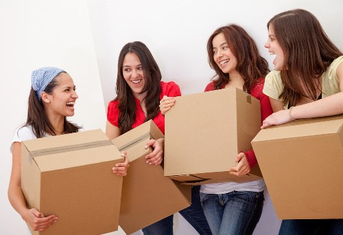 Local removal team loading furniture for a move in Kennington