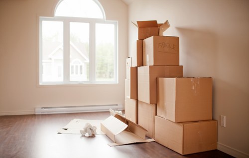 Office furniture and business equipment prepared for removal in Kennington