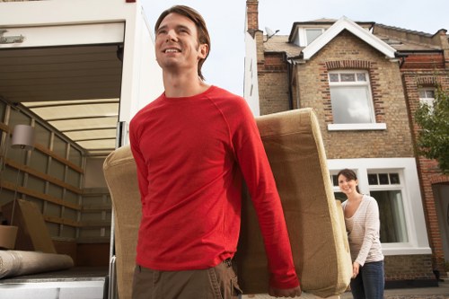 Professional movers handling access challenges in a Kennington flat move