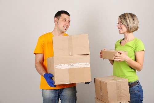 Packed boxes and furniture prepared for a house move in Kennington